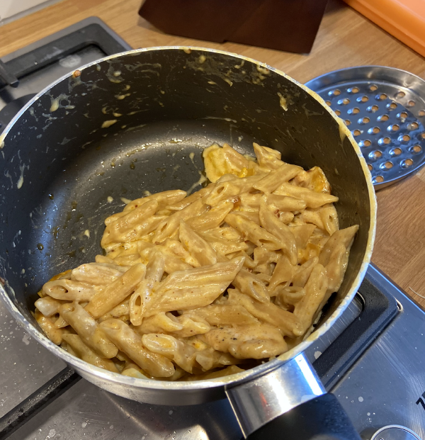 Serving of twisted mac and cheese, in a pot.